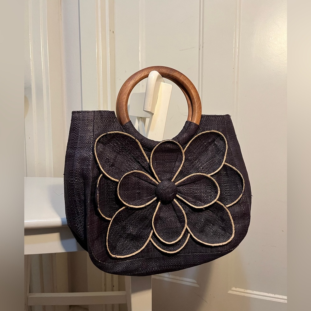 Mar y sol Guadalupe’s floral raffia tote. Wooden handles.